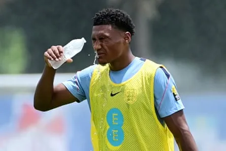Ollie Watkins during training Ollie Watkins splashes his face with water during training