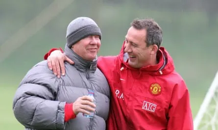 Sir Alex Ferguson talks with Rene Meulensteen of Manchester United during a First Team Training Session at Carrington Training Ground on 17 April 2009 in Manchester, England.