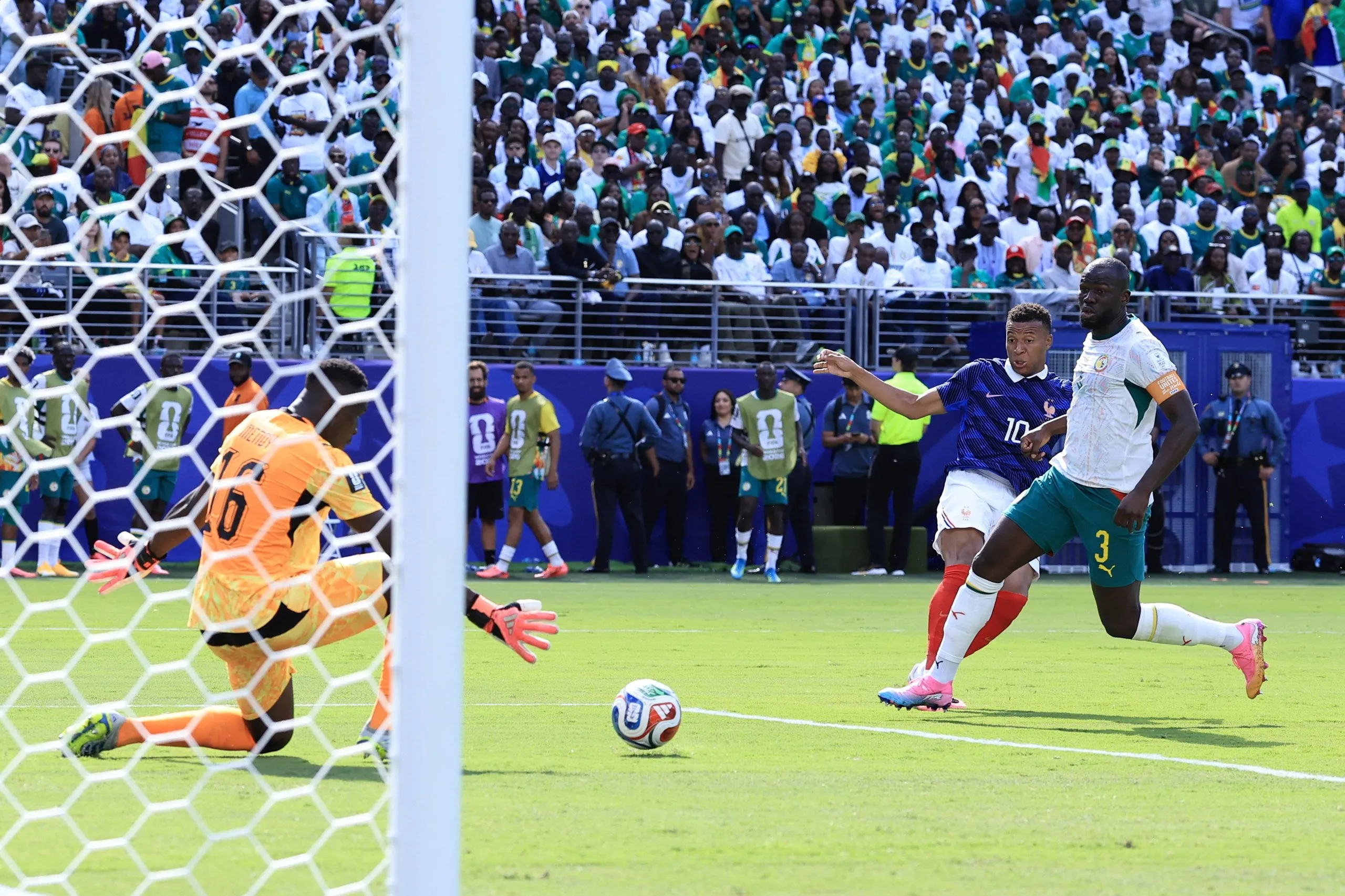 Kylian Mbappé swivels and shoots to open the scoring for France