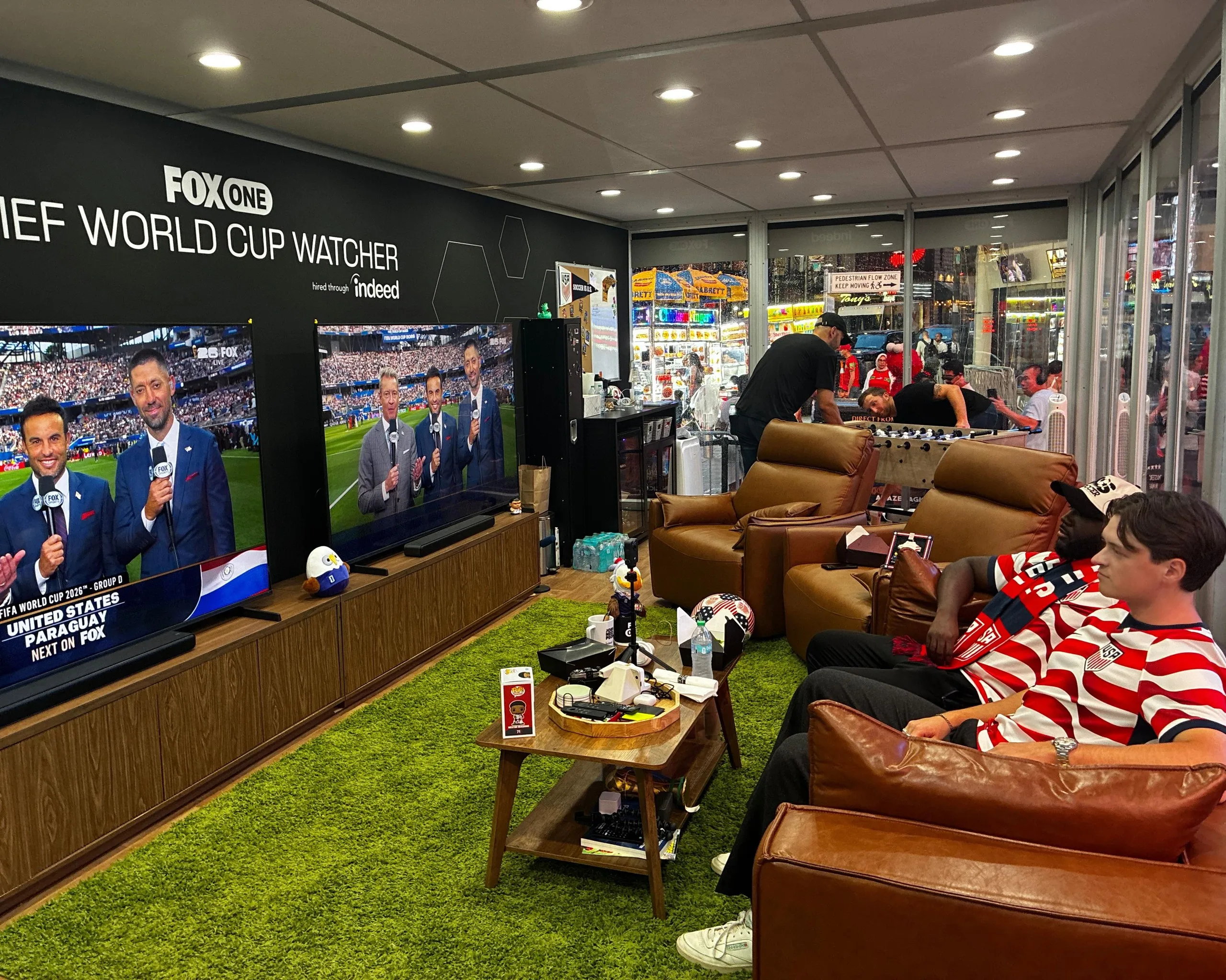 Kevin Kotoko and Austin Franklin watching World Cup matches in Times Square 