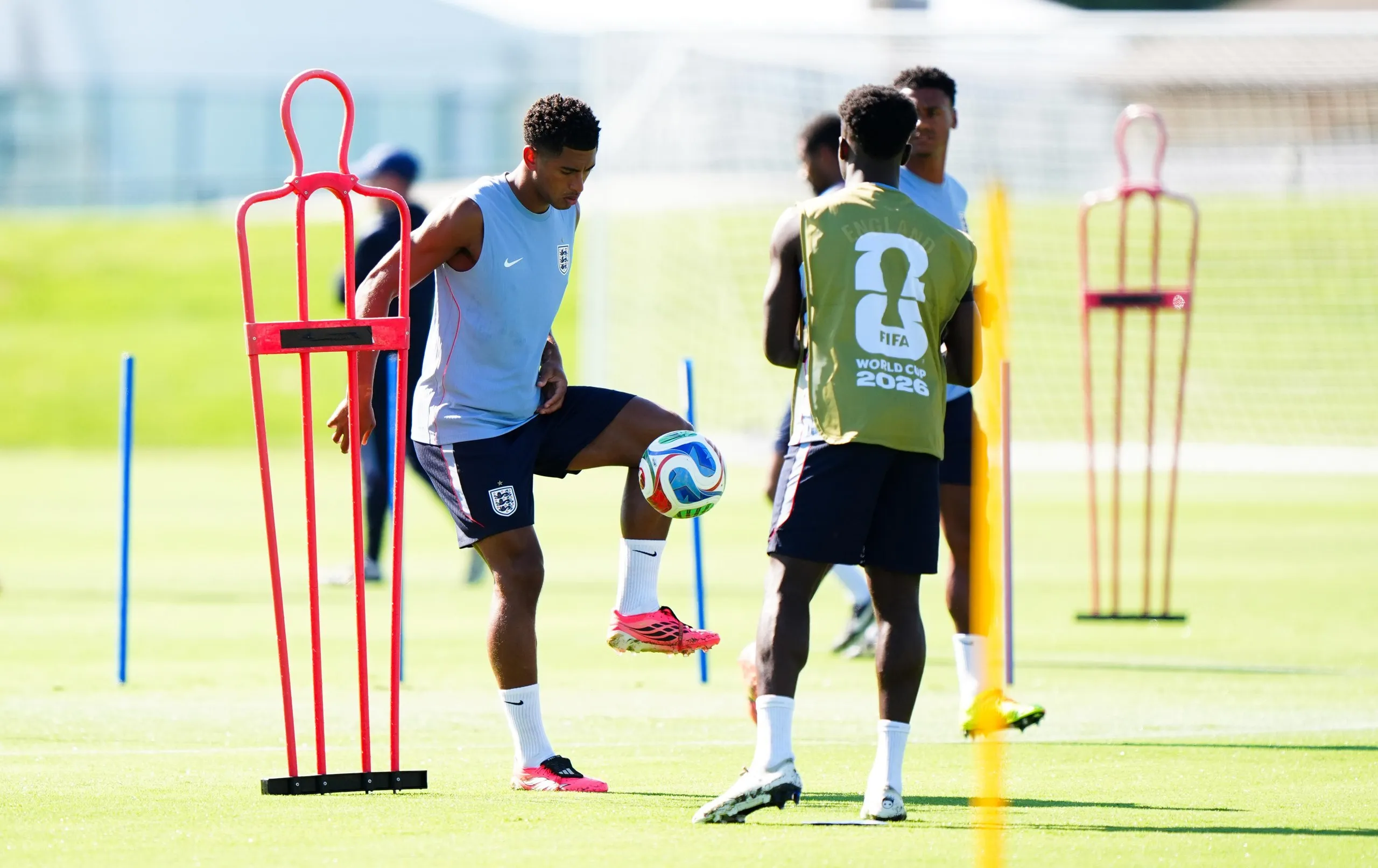 England’s Jude Bellingham dribbles the ball during a training session at Swope Soccer Village, Kansas City