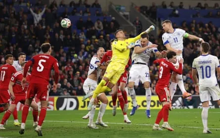Edin Dzeko equalises against Wales in their playoff in Cardiff Edin Dzeko equalises against Wales in their playoff in Cardiff