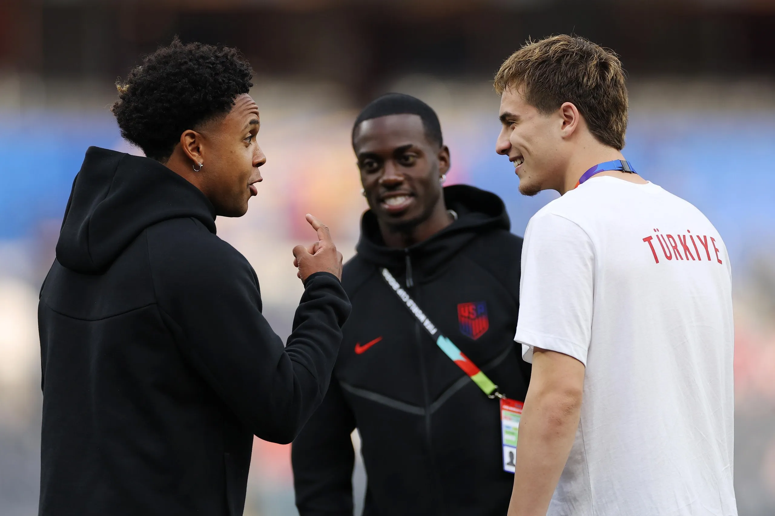 Juventus teammates Kenan Yildiz and Weston McKennie have a chat on the pitch ahead of kick-off in Los Angeles.