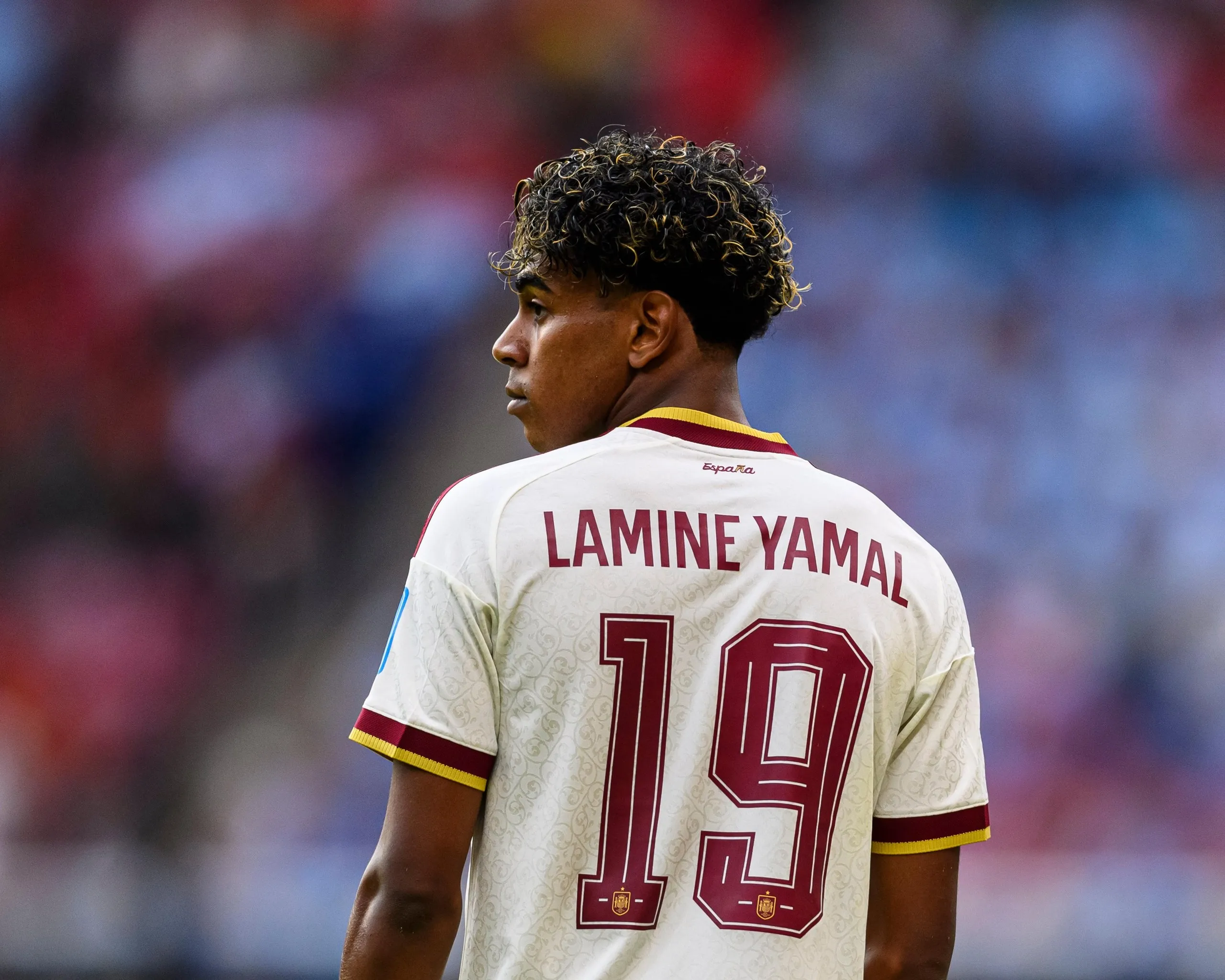 Spain’s Lamine Yamal looks over his shoulder.