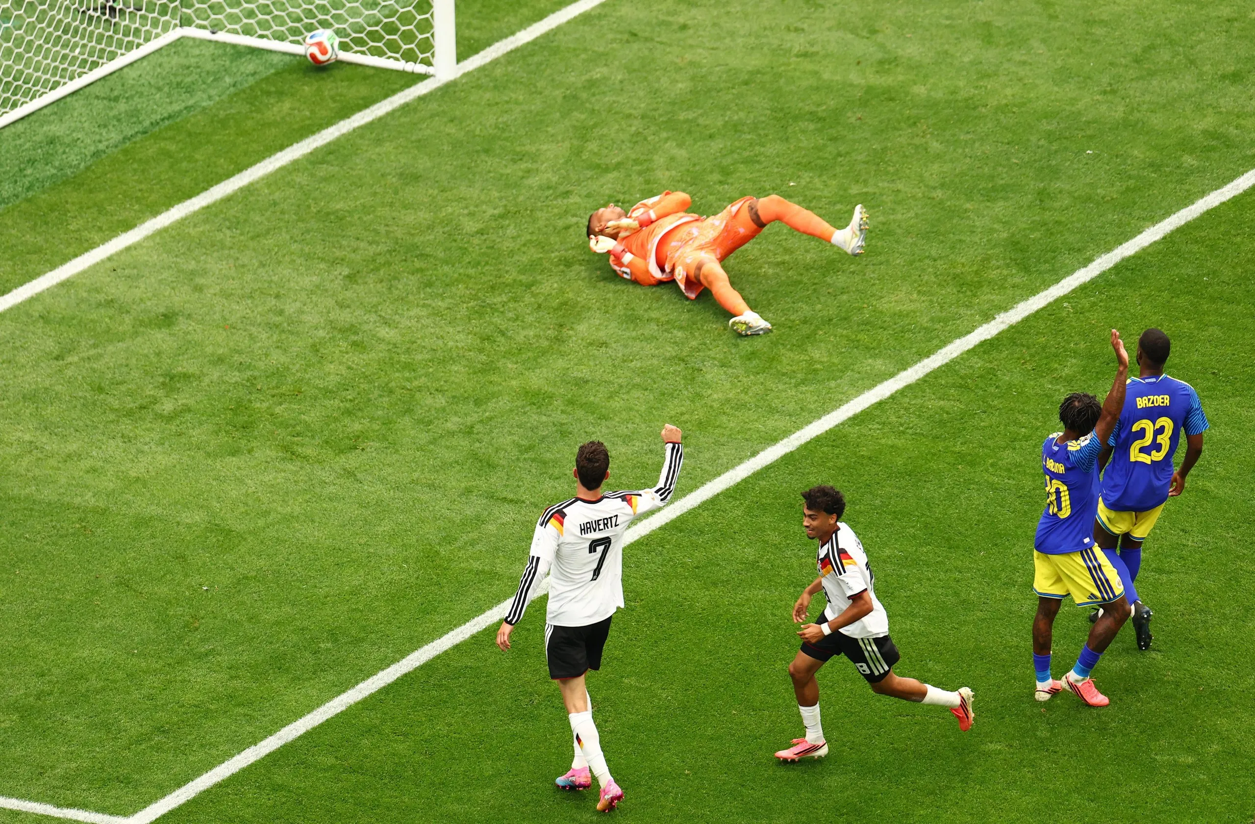 Germany's Nathaniel Brown celebrates scoring their fifth goal.