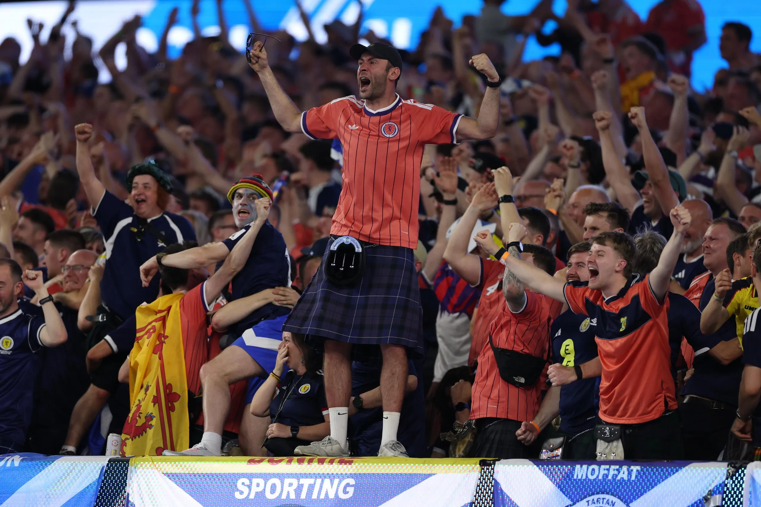 Fans celebrate in the stands after John McGinn scores Scotland’s first men’s World Cup goal for 28 years