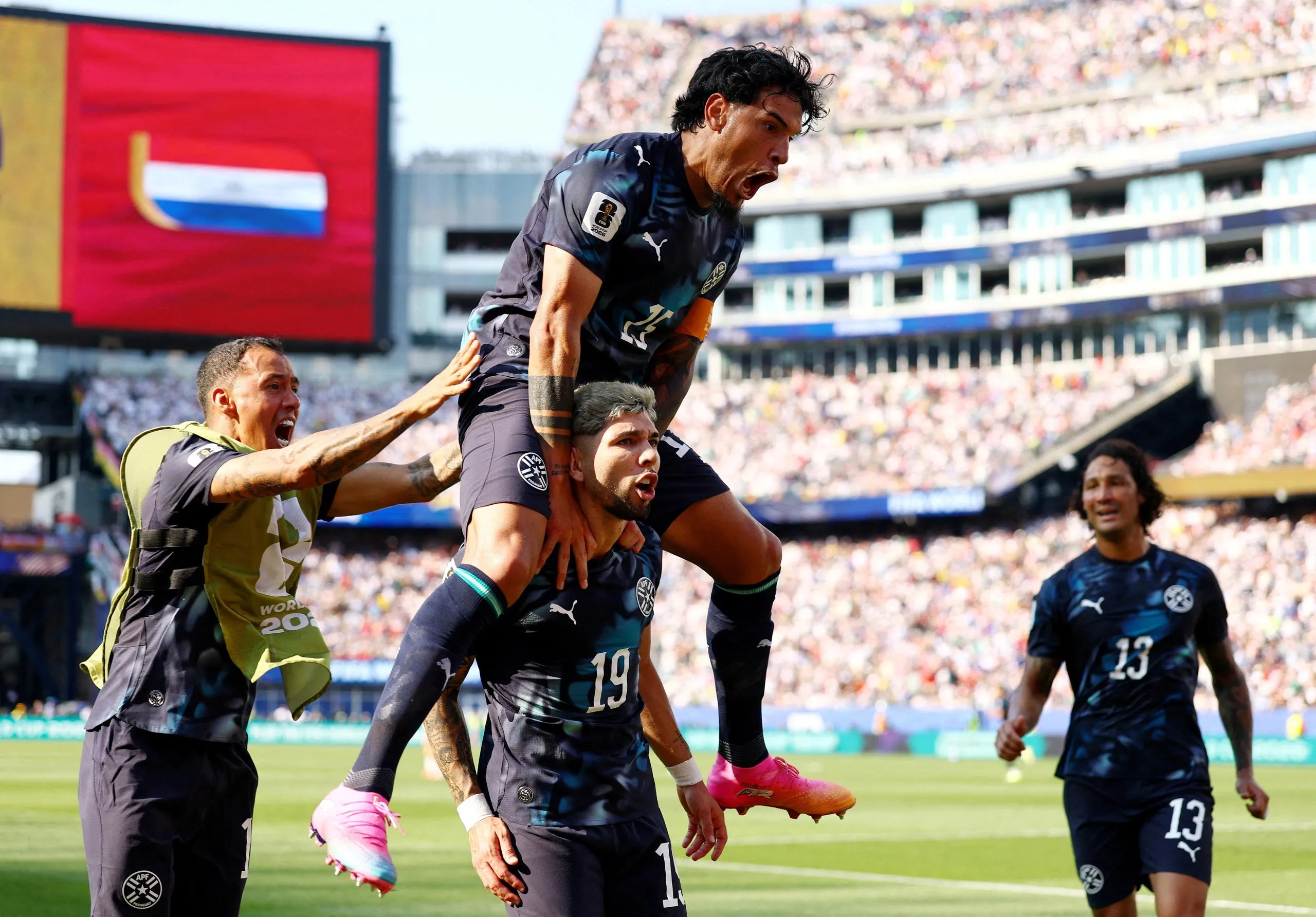 Paraguay’s Julio Enciso celebrates after opening the scoring