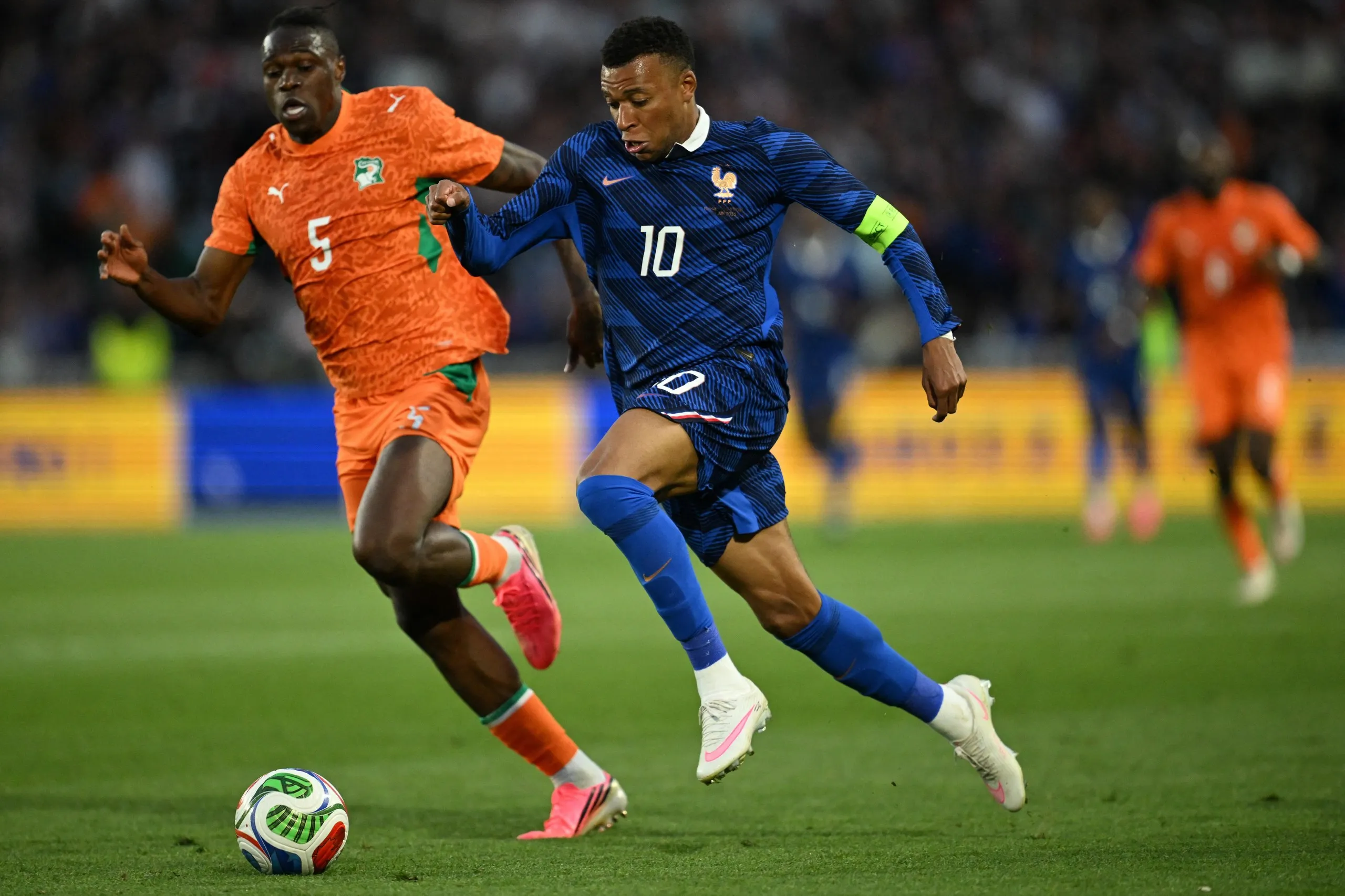 France’s Kylian Mbappé takes on Côte d’Ivoire’s Wilfried Singo during their friendly meeting in Nantes this month.
