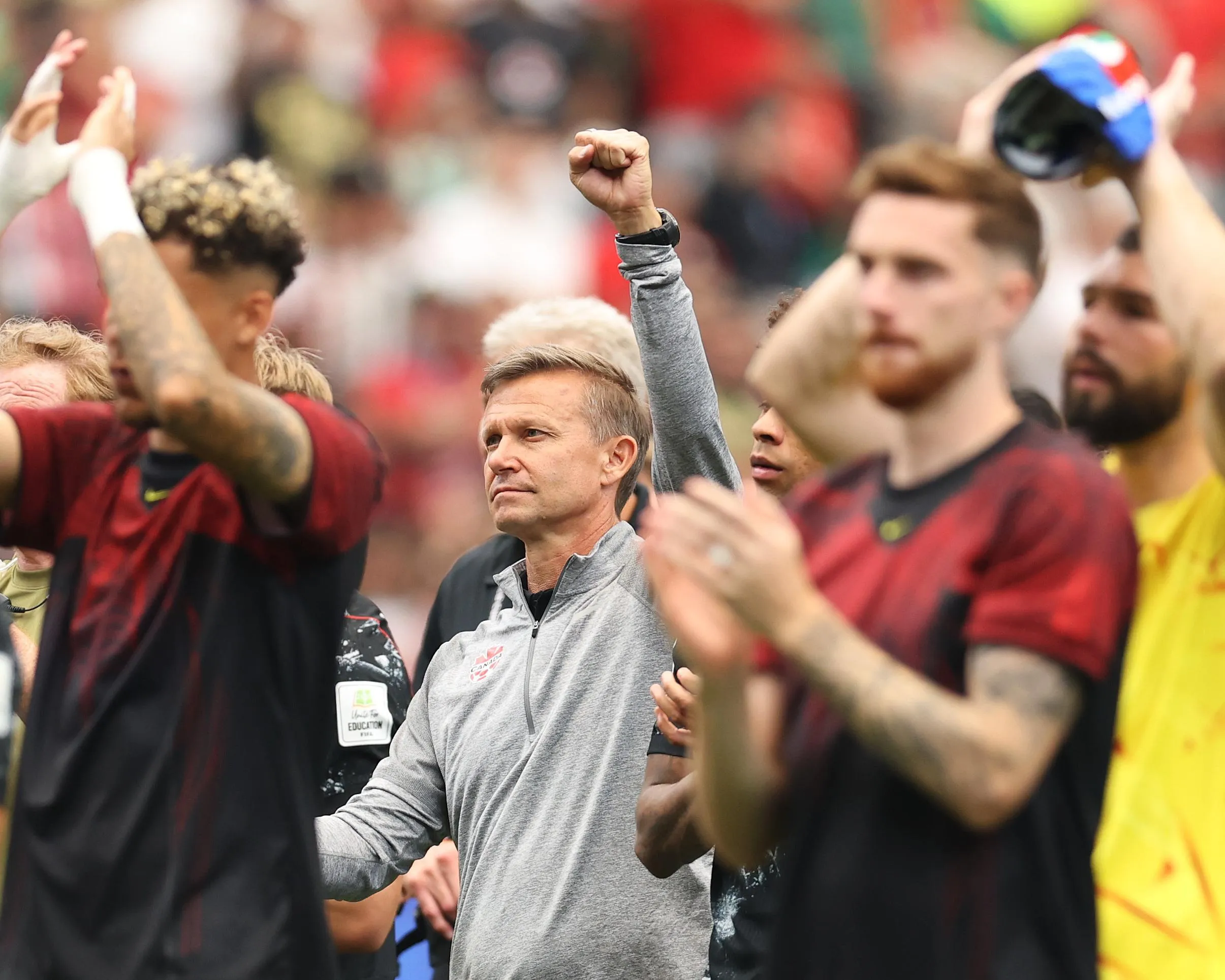 Jesse Marsch and his Canada players applaud the fans
