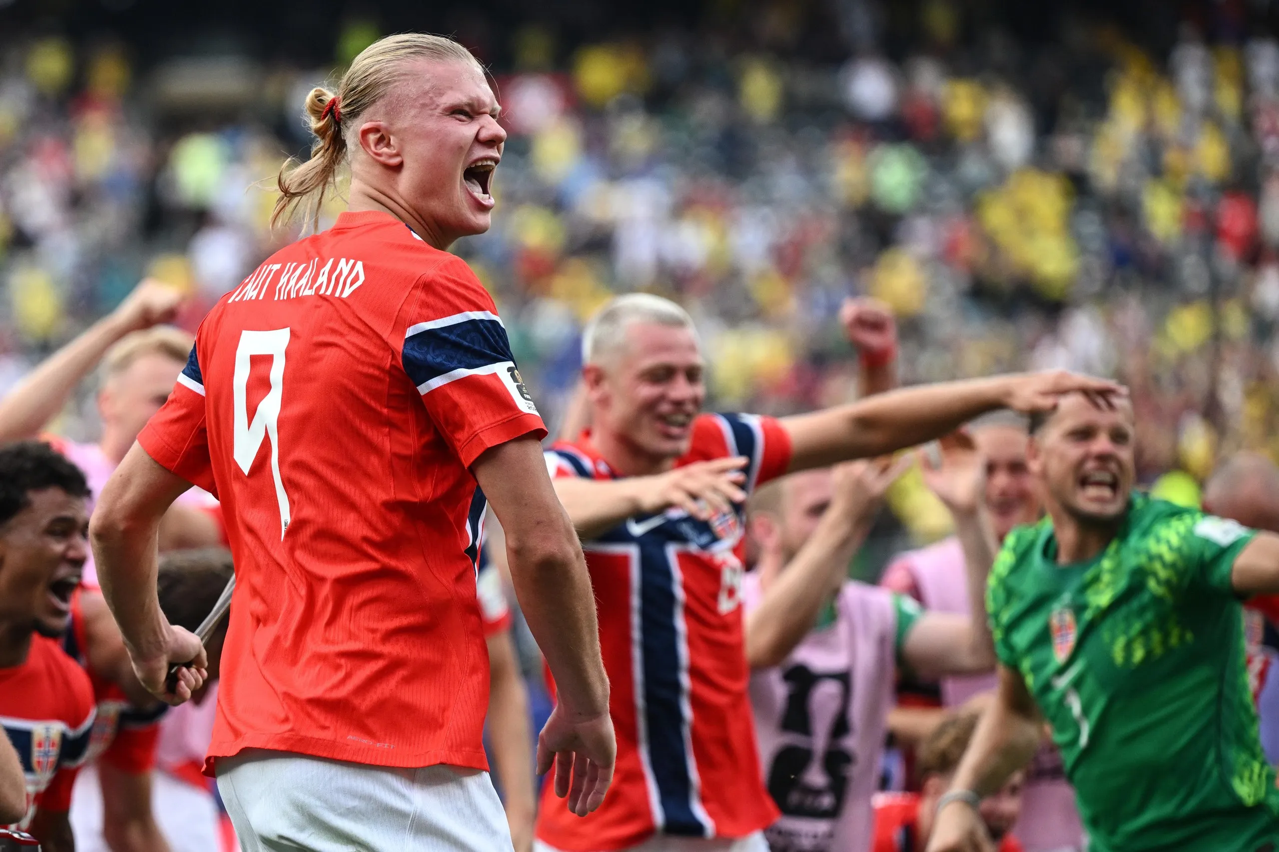 Erling Haaland celebrates beating Brazil