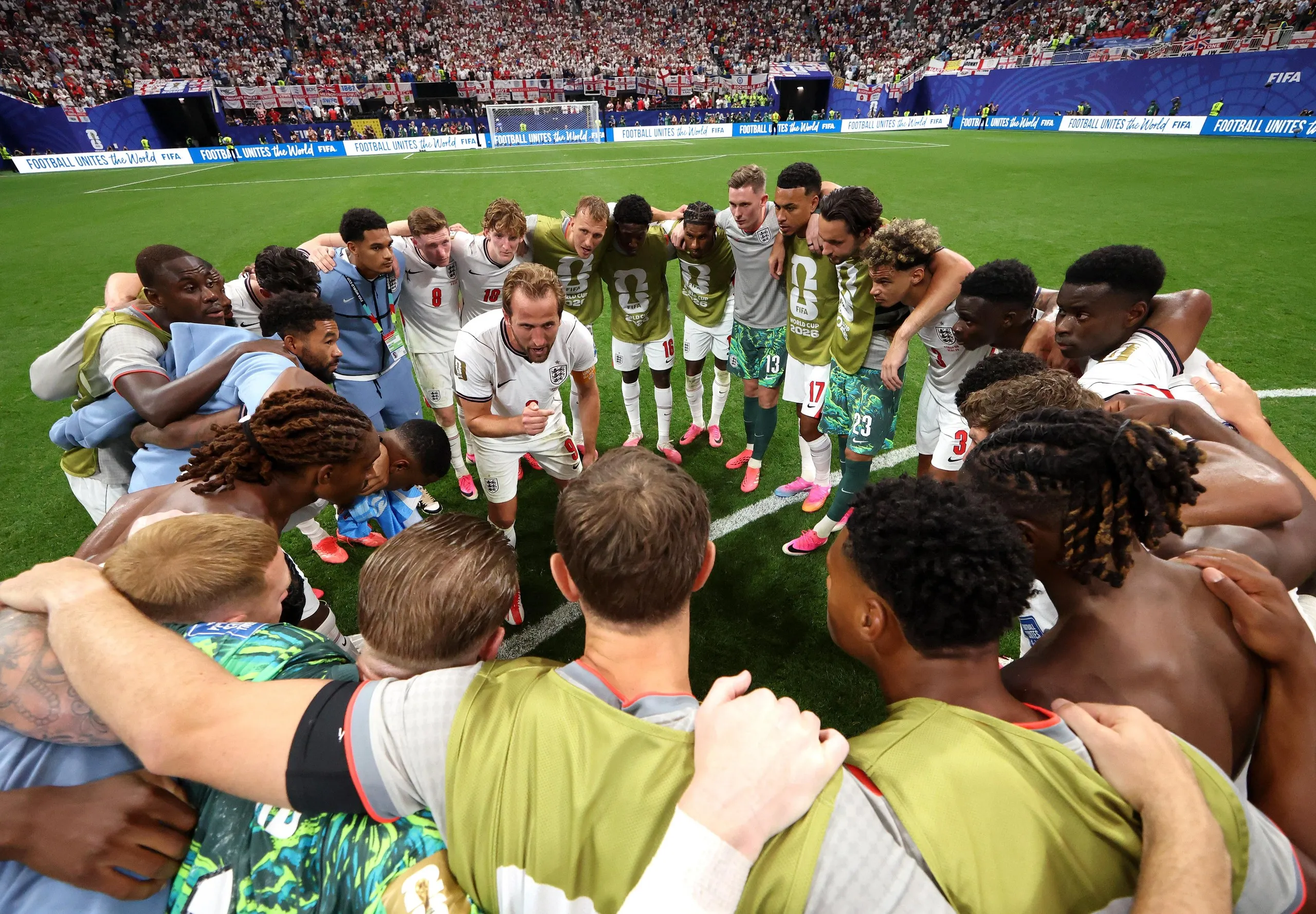 Harry Kane speaks to his teammates in the huddle after their victory over the Democratic Republic of the Congo