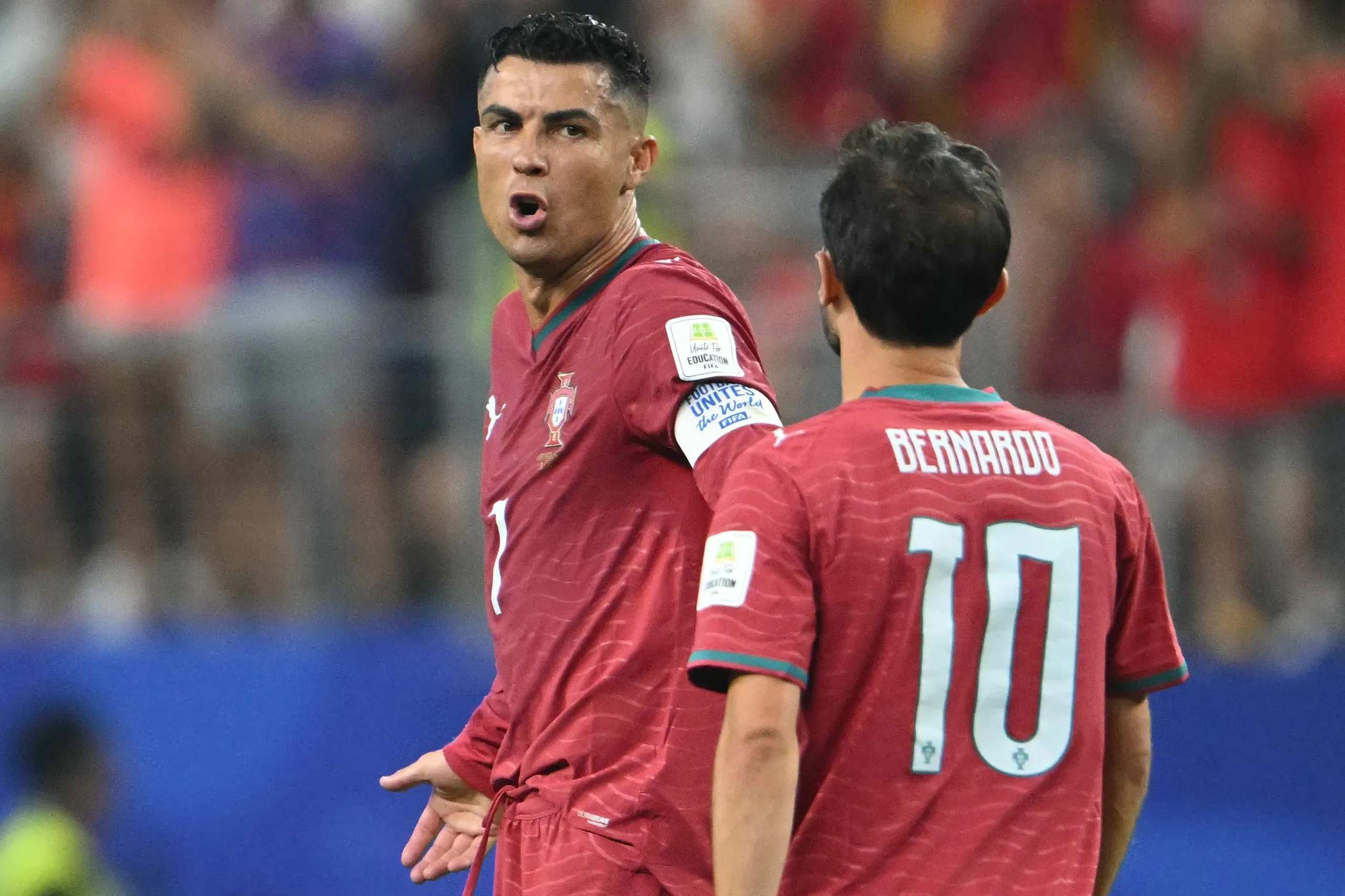Cristiano Ronaldo complains to Bernardo Silva after watching Portugal concede late on